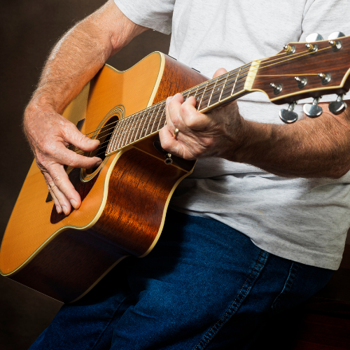 person playing guitar